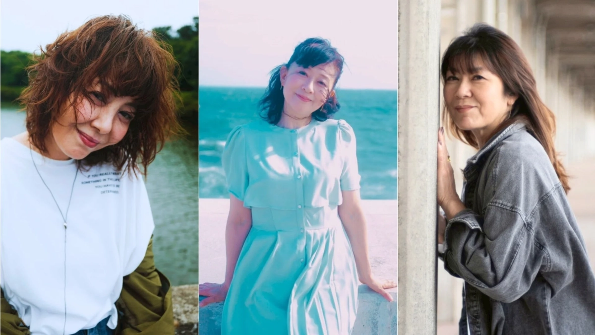 笑顔でポーズをとるID85の3人