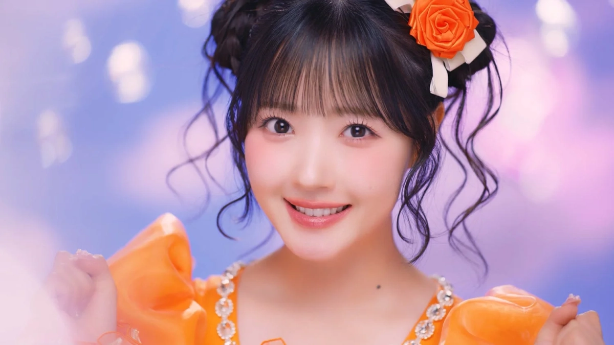 オレンジ色のドレスを着たメンバー