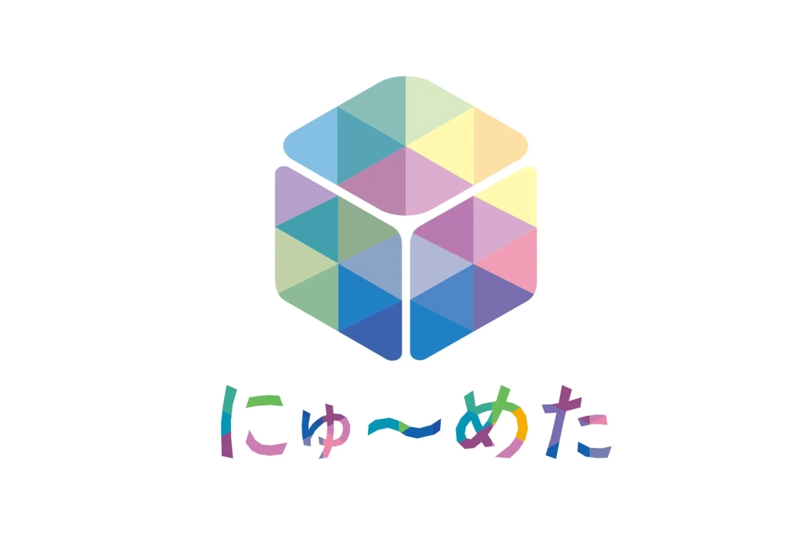 にゅ～めた ロゴ
