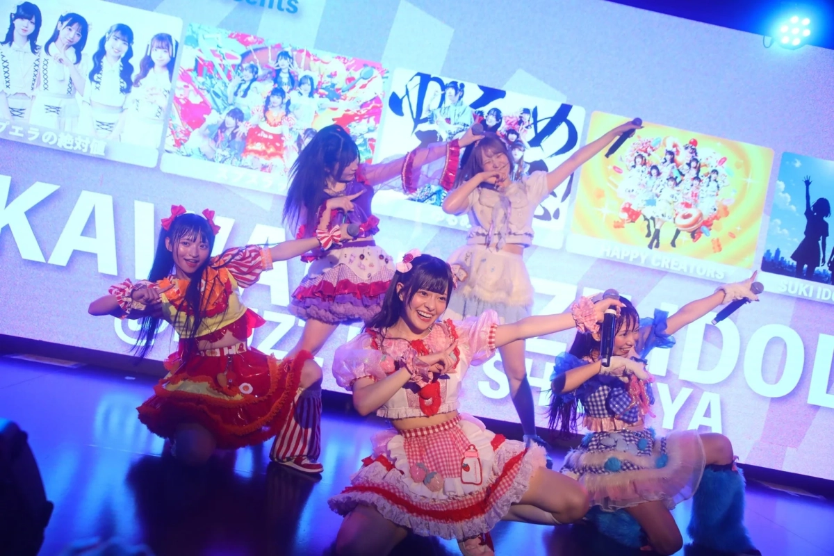 ステージでパフォーマンスするアイドル
